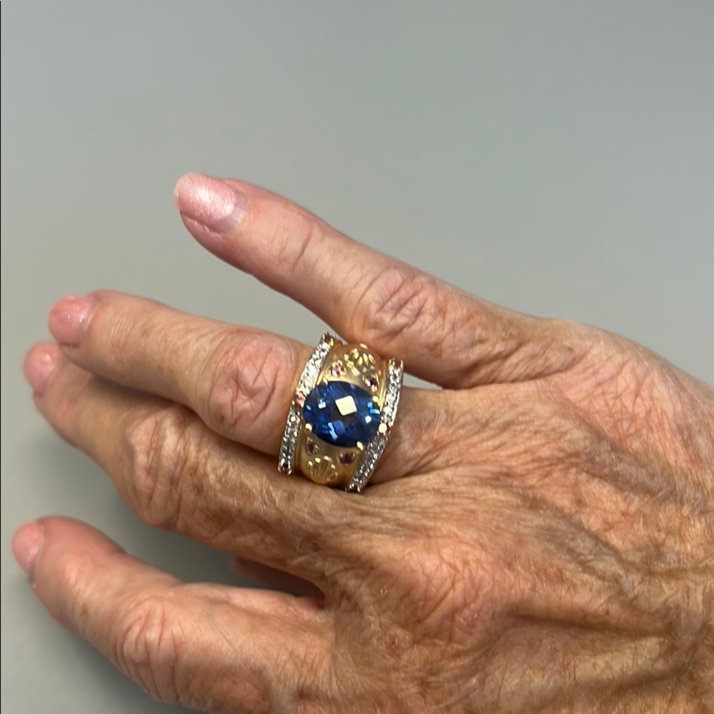 14k Gold and Blue Topaz checkerboard cut Gemstone Ring. Gram weight worth price!